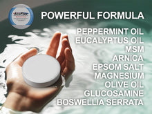 Load image into Gallery viewer, A female hand placing an AcuPlus bath bomb into a bath tub.