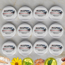 Load image into Gallery viewer, Multiple containers of AcuPlus Bath Bombs on a textured surface with decorative elements.